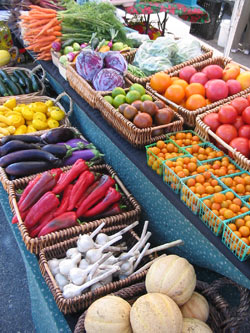 Our farmstand with plenty of vegetables.