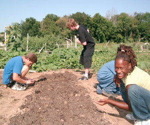 Youth working in the garden.
