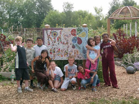 Kids posing in the garden.